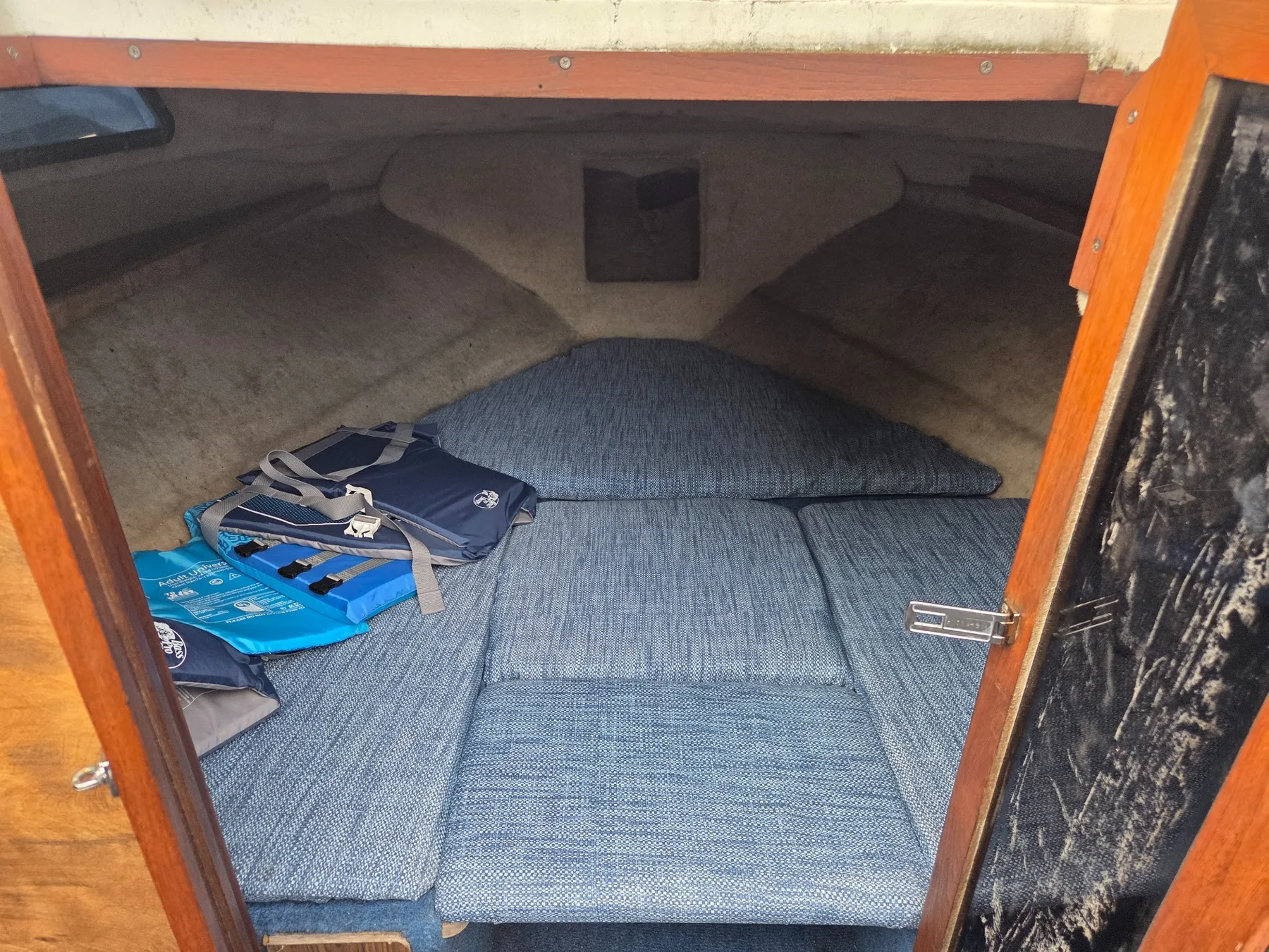 Cuddy cabin cushions and sleeping area.